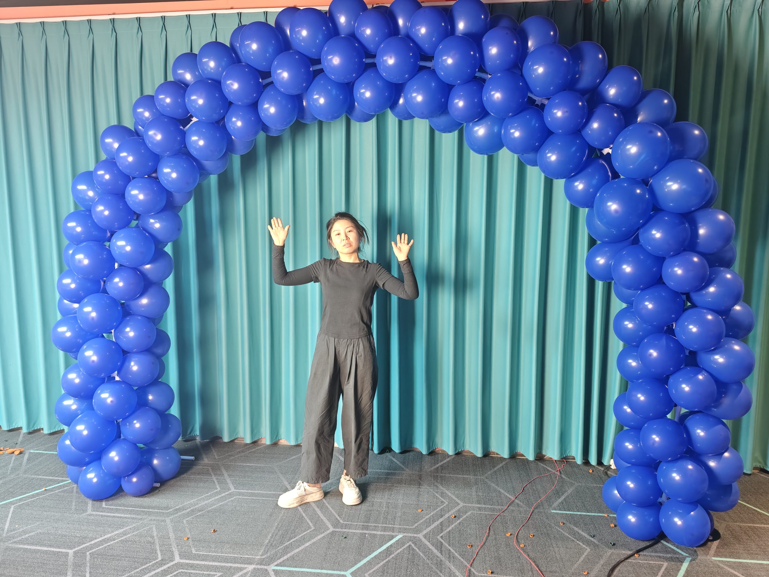 Blue inflatable balloon arch for race finish line events